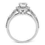 This intricate vintage-inspired engagement ring has two accent sapphire side stone totaling .25 ctw, while .33 ctw of white diamonds sparkle on the rest of the setting.