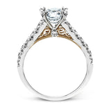 This beautiful white gold engagement ring is set with .55 ctw of round white diamonds flanking the center stone, as well as a distinctive rose gold accent