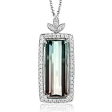 Clean lines and .32 ctw of shimmering white diamonds let 7.55 ctw of gorgeous watermelon tourmaline take center stage in this elegant white gold pendant
