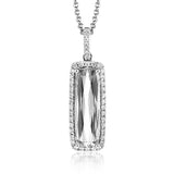 This sleek, vintage-inspired white gold pendant features .22 ctw of white diamonds framing a gorgeous 3.07ctw of green tourmaline