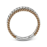 This unique white gold wedding band features .49 ctw of round white diamonds as well as a distinctive edging of coiled rose gold
