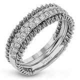 This unique white gold wedding band features .49 ctw of round white diamonds as well as a distinctive edging of coiled rose gold
