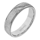 This classic men's wedding band features a matte texture in the center, edged by high polished metal. It is sure to be in style for years to come.