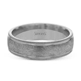 This classic men's wedding band features a matte texture in the center, edged by high polished metal. It is sure to be in style for years to come.