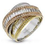 This exquisite ring is crafted in three tones of 18k gold and features an overlapping design set with .41 ctw of round diamonds and 2.32 ctw of baguette diamonds.