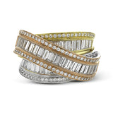 This exquisite ring is crafted in three tones of 18k gold and features an overlapping design set with .41 ctw of round diamonds and 2.32 ctw of baguette diamonds.