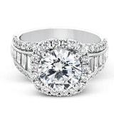 This show-stopping halo design contains .88 ctw of round diamonds along with a whopping 1.03 ctw of baguette cut diamonds.
