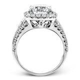 This show-stopping halo design contains .88 ctw of round diamonds along with a whopping 1.03 ctw of baguette cut diamonds.