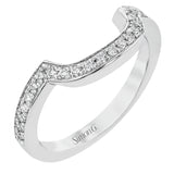 Specially shaped sapphires formed a halo around the center stone in this remarkable engagement ring, accented by .42 ctw of white diamonds as well.
