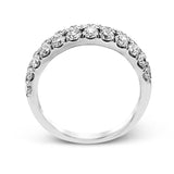 Simple yet elegant, this understated white gold band sparkles with 1.57 ctw of round white diamonds