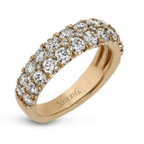 Simple yet elegant, this understated white gold band sparkles with 1.57 ctw of round white diamonds