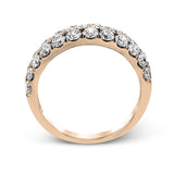Simple yet elegant, this understated white gold band sparkles with 1.57 ctw of round white diamonds