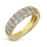 Simple yet elegant, this understated white gold band sparkles with 1.57 ctw of round white diamonds