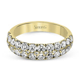 Simple yet elegant, this understated white gold band sparkles with 1.57 ctw of round white diamonds