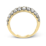 Simple yet elegant, this understated white gold band sparkles with 1.57 ctw of round white diamonds