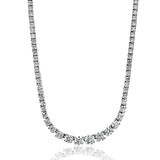 This simple, elegant white gold necklace glimmers with 3.55 ctw of round white diamonds