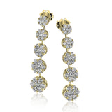 These lovely floral earrings have a touch of 60s inspired vintage feeling, with an astounding 3.06 ctw of white diamonds.