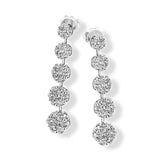 These lovely floral earrings have a touch of 60s inspired vintage feeling, with an astounding 3.06 ctw of white diamonds.