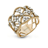 This unique rose gold band's striking openwork is accentuated by accents of white gold and .65 ctw of round white diamonds