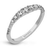 These interlocking 18k white gold band can be worn together with the rose and yellow gold bands , producing the look of one larger ring, or on their own for a simple statement. Each contains .45 ctw of shining white diamonds. Perfect for stacking.