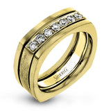 This statement men's band features a two-tone 14k gold design with yellow gold along the outside and white gold on the inside set with a line of .41 ctw white diamonds.