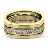 This statement men's band features a two-tone 14k gold design with yellow gold along the outside and white gold on the inside set with a line of .41 ctw white diamonds.