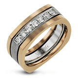 This statement men's band features a two-tone 14k gold design with yellow gold along the outside and white gold on the inside set with a line of .41 ctw white diamonds.
