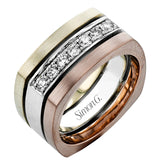 This statement men's band features a two-tone 14k gold design with yellow gold along the outside and white gold on the inside set with a line of .41 ctw white diamonds.
