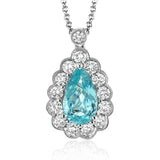 This gorgeous white gold pendant features a halo of .46 ctw of round white diamonds highlighting a beautiful .80 ctw pear shaped paraiba tourmaline.