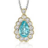 This gorgeous white gold pendant features a halo of .46 ctw of round white diamonds highlighting a beautiful .80 ctw pear shaped paraiba tourmaline.