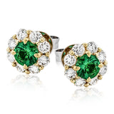 These lovely, vintage-inspired white gold earrings feature 1.15 ctw of sapphires framed by halos containing 1.17 ctw of round white diamonds.