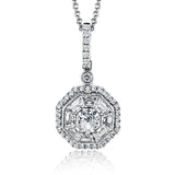 This remarkable, contemporary white gold pendant features a dazzling 1.12 ctw mosaic white diamond centerpiece framed by a subtle .09 ctw of round white diamond accents.