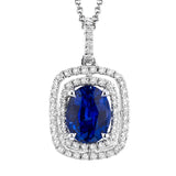Classic yet distinctive, this white gold pendant features an airy double halo set with .23 ctw of round white diamonds framing a beautiful 1.49 ctw oval shaped sapphire.