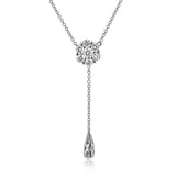 This delicate, understated pendant features .47 ctw of round white diamonds in a lovely white gold setting