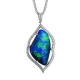 A one-of-a-kind statement pendant has an oval 11.88 ct. boulder opal, framed by an abstract line of white diamonds 0.31 ctw., on an 18 chain