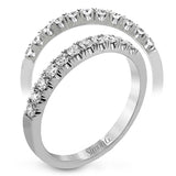 This classic wedding band contains a stunning .50 ctw of white round diamonds