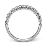 This classic wedding band contains a stunning .50 ctw of white round diamonds