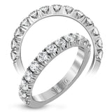 This classic wedding band features a distinctive setting style that shows off the 1.00 ctw of white diamonds to their full advantage.
