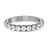 This classic wedding band features a distinctive setting style that shows off the 1.00 ctw of white diamonds to their full advantage.