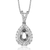 This elegant, vintage-inspired pendant glimmers with .28 ctw of round white diamonds and a .72 ctw pear shaped emerald, all set in sophisticated two-tone gold.