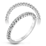This classic wedding band contains a stunning .35 ctw of white round diamonds
