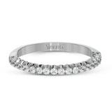 This classic wedding band contains a stunning .35 ctw of white round diamonds