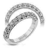 This classic wedding band features a distinctive setting style that shows off the .75 ctw of white diamonds to their full advantage.
