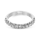 This band pairs perfectly with an engagement ring, or can be worn on its own or stacked with other rings. It contains .50 ctw of white diamonds.