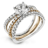 This distinctive bridal set design features a double-layer wedding band that fits around the engagement ring. The set contains .77 ctw of white diamonds.
