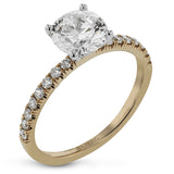 This distinctive bridal set design features a double-layer wedding band that fits around the engagement ring. The set contains .77 ctw of white diamonds.