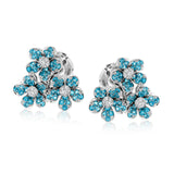 These charming 18k white gold stud earrings feature a grouping of five-petaled flowers made from 1.09 ctw of bright, saturated blue paraiba tourmaline and .17 ctw of white diamonds.