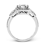 This amazing 18k white gold engagement ring features vintage-inspired design elements set with .28 ctw of white diamonds.