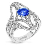 The lovely vintage-inspired design of this 18k white gold ring elongates the finger and contains 1.07 ctw of white diamonds.