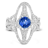 The lovely vintage-inspired design of this 18k white gold ring elongates the finger and contains 1.07 ctw of white diamonds.